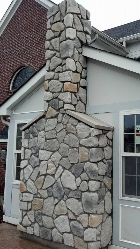 Custom stone fireplace installation